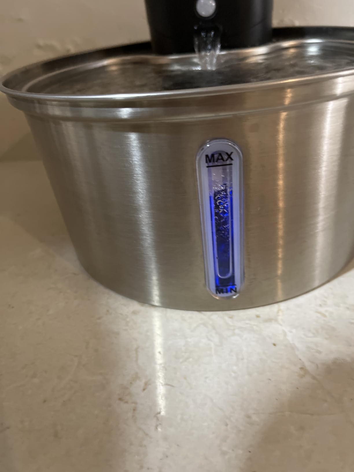 Foto enviada por cliente da fonte de água em uso
